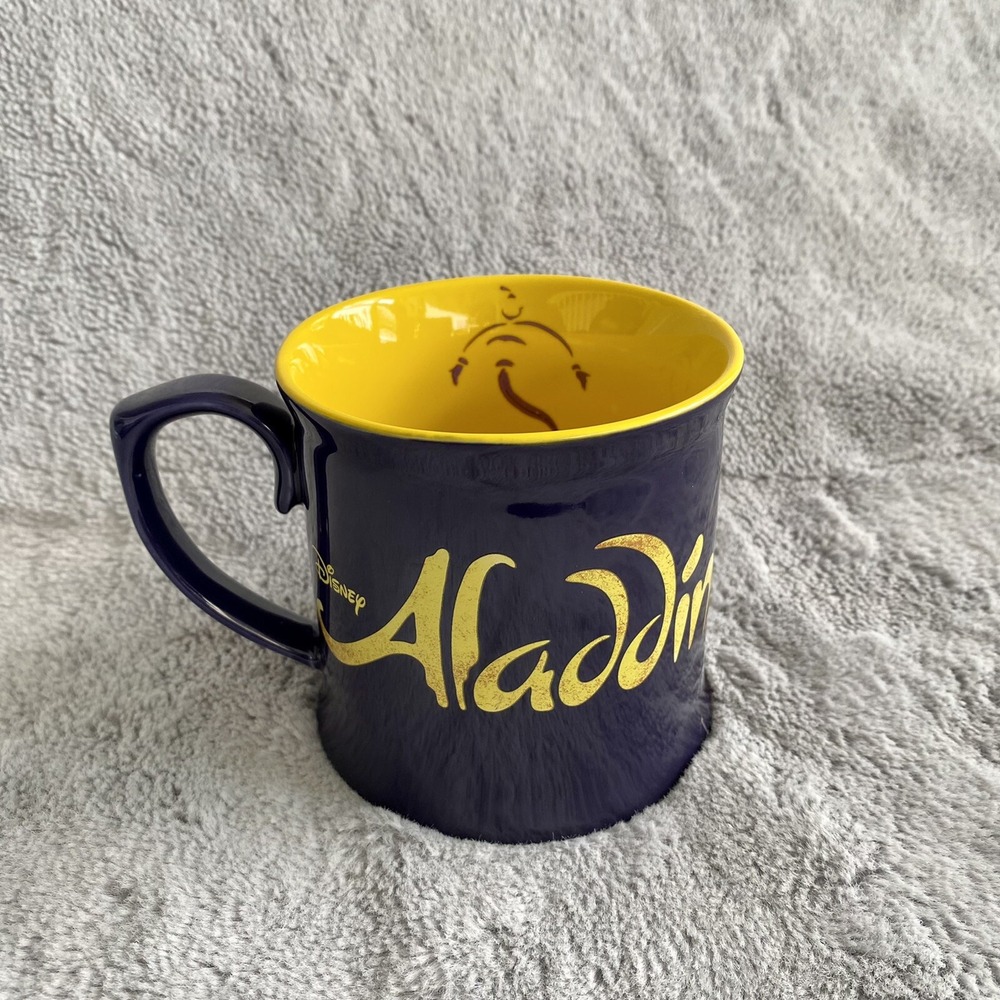 Disney‎ Aladdin Dark Purple and Gold Ceramic Coffee Mug Yellow Genie Interior